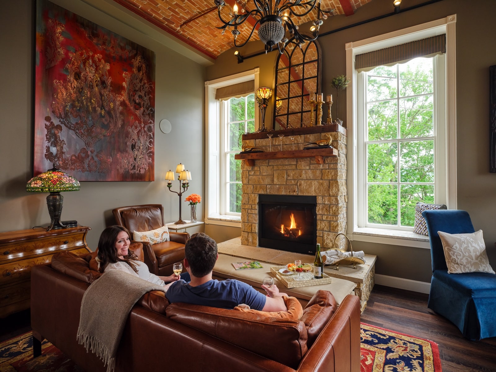 Discover the #1 Weekend Getaway in the Midwest 2 Couple enjoying time by the fire at our Bed and Breakfast in Galena, the best weekend getaway in the Midwest
