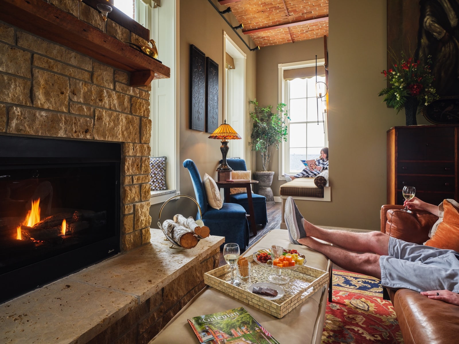 couple enjoying wine and relaxing at our Galena Bed and Breakfast