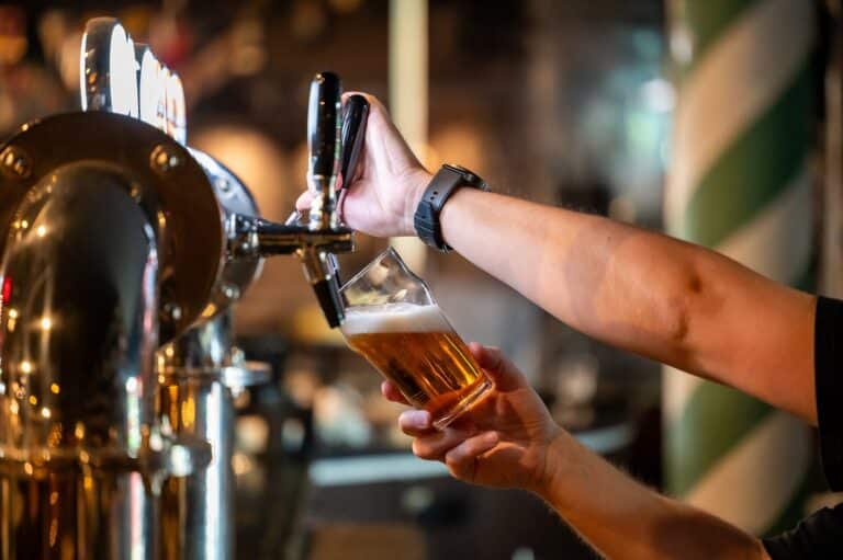 Bartender pulling a tap at places like Galena Brewing Company in Galena