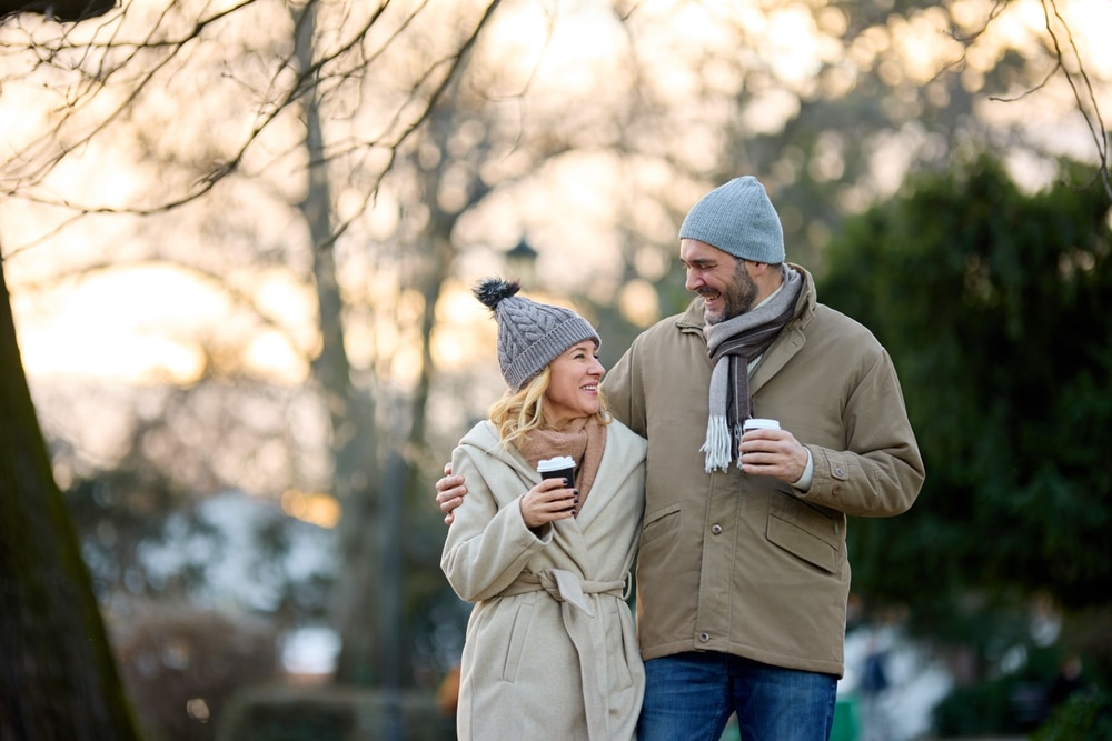 A couple taking a winter walk in galena - an example of What to do in Galena, IL this winter