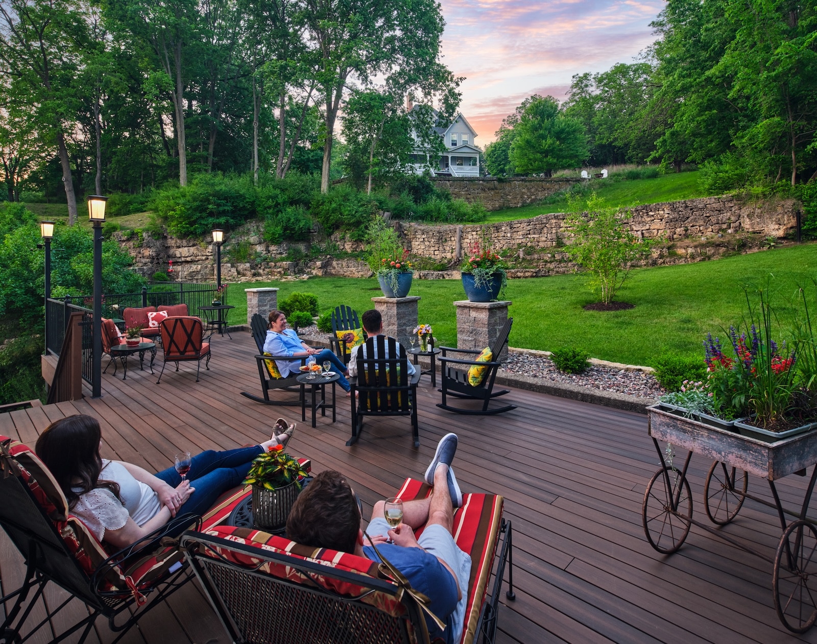 People enjoying our back deck and wine and appetizers at our Galena Lodging near downtown
