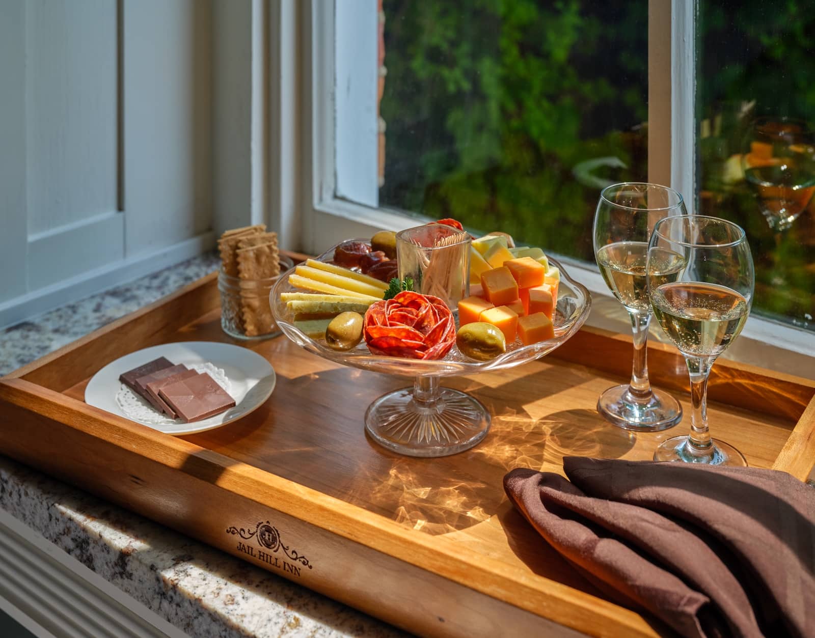 Explore Massbach Ridge Winery and the Best of Galena Wine Tasting 2 A stay at the Jail Hill Inn, a Galena Bed and Breakfast, includes amenities like a charcuterie board complete with a spread of chocolate and wine.